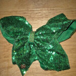 JoJo Siwa Green Sequin Bow with gold accents Pre-Owned.  St. Patrick's Day